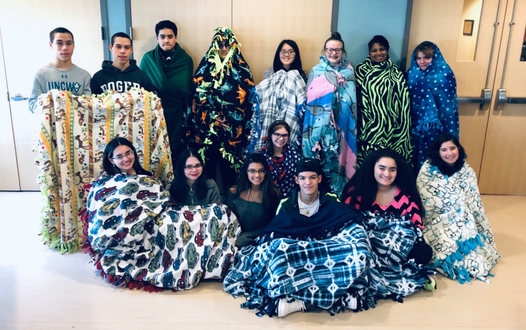Our teen volunteers helped us make so many blankets to help keep someone warm this past winter!